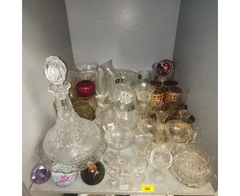 A quantity of glassware to include Royal Worcester ship decanter together with mixed paperweights to include Caithness 'Polka
