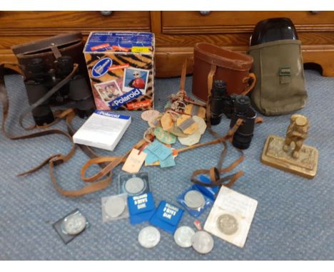 A Polaroid Coolcam, two pairs of binoculars, a large quantity of Paddock and Grandstand racing passes, Crowns and other items