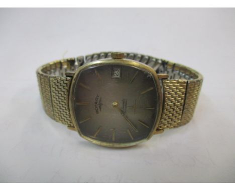 A Rotary 9ct gold gents manual wind wristwatch on a later expanding braceletLocation: 