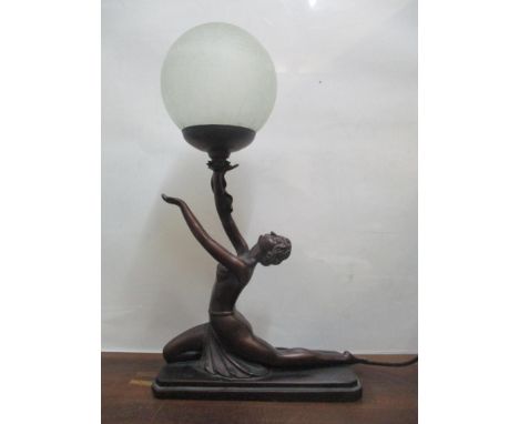 An Art Deco style table lamp in the form of a nude female together with a brass and onyx standard lampLocation: 