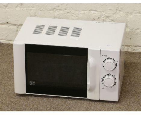A white enamel microwave and wall mounted chrome cork puller.