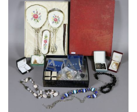 A boxed mirror and brush set along with a collection of costume jewellery.