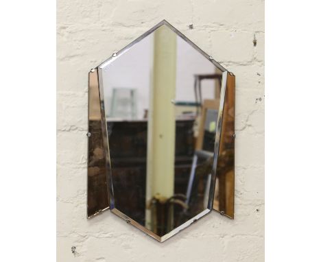 A bevel edged Art Deco mirror. Condition Report. To be used as a guide only. No chips or cracks. Very minor tarnishing to the