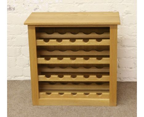 A good quality light oak twenty bottle wine rack.