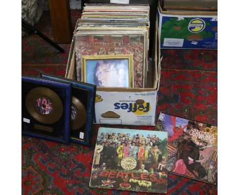 A collection of L.P records rock and pop to include the Beatles and Rolling stones.