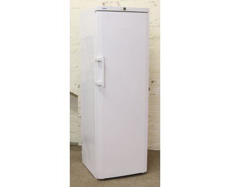 A white enamel Liebherr tall standing no frost freezer with eight storage drawers.