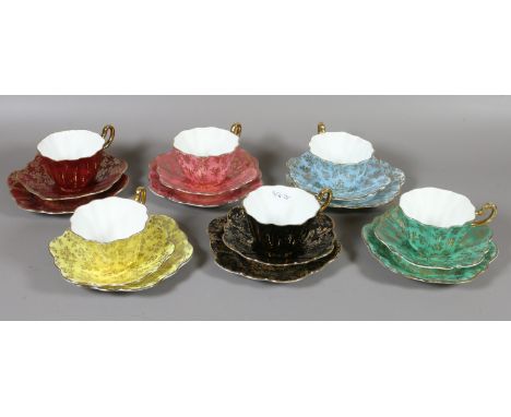A Royal Stuart multi coloured six part tea service with gilt decoration by Spencer Stevenson England.