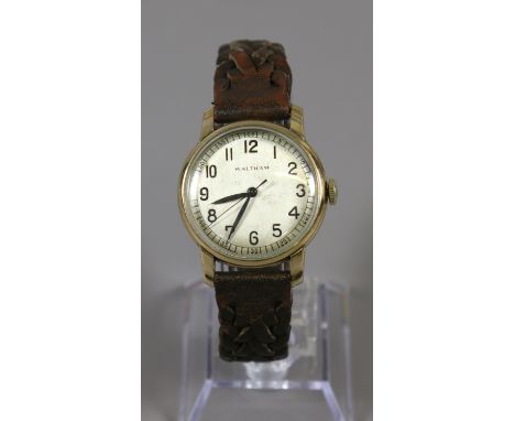 A gentleman's gold plated wristwatch by Waltham with silvered dial and second sweep finger.