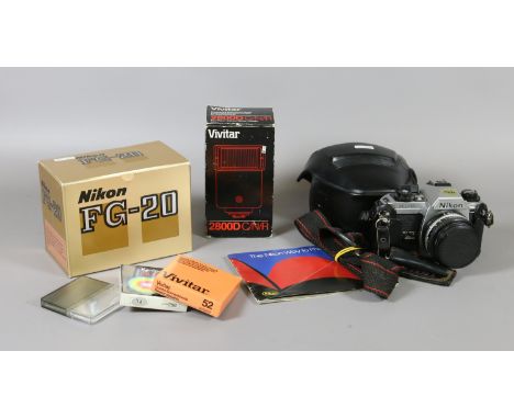 A Nikon FG-20 cased camera, a Vivitar flashlamp and filters etc.