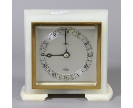 An onyx cased Elliott mantel clock with silvered dial and Roman numeral markers.