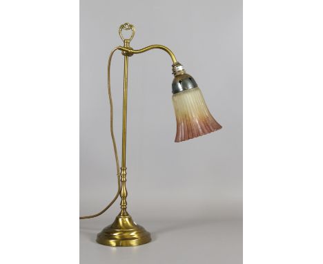A brass based rise and fall lamp, singular branched with frosted glass shade.
