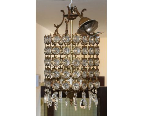 A French gilt metal hexagonal and cut glass three branch hall lantern. 