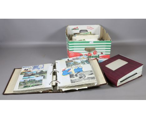 Two postcard albums and contents of postcards, along with many loose examples.