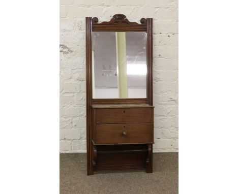 A Victorian mahogany framed hall mirror with reeded mouldings incorporating a lidded compartment and single drawer.