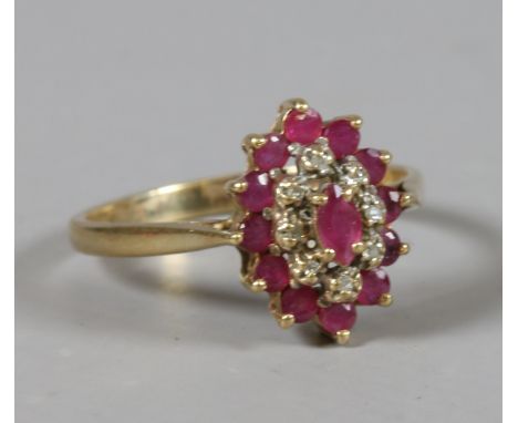 A 9ct gold ruby and diamond cluster ring UK size T1/2.