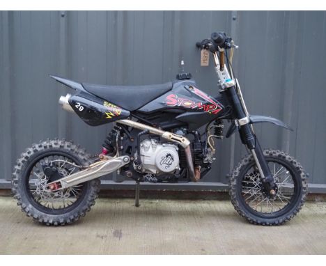 Stomp pit bike. 140cc. Engine turns over. No docs 