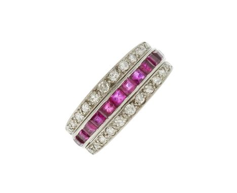 An Art Deco platinum, calibre-cut ruby and sapphire full eternity flip ring, with single-cut diamond hinged sides, estimated 