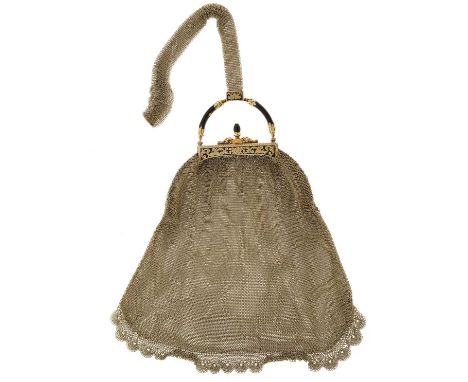 An early 20th century 14ct gold mesh purse or evening bag, with black enamel scrolling surmount, suspended from a 14ct gold m