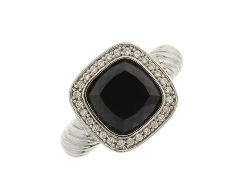 A 14ct gold onyx and brilliant-cut diamond cluster ring, with openwork gallery and grooved shoulders, estimated total diamond