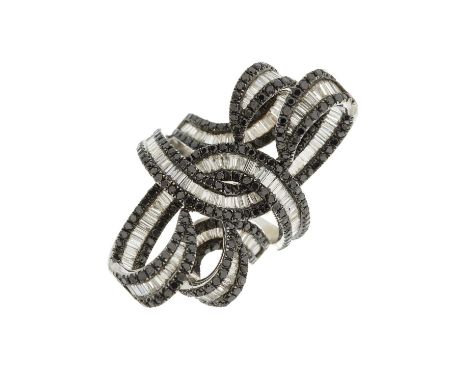 An 18ct gold diamond and black diamond cocktail ring, designed as an abstract openwork scroll, total diamond weight 5.05ct en