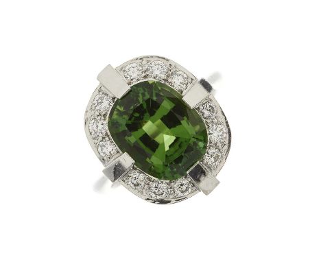 An 18ct gold green tourmaline and brilliant-cut diamond cluster dress ring, tourmaline estimated weight 5ct, estimated total 