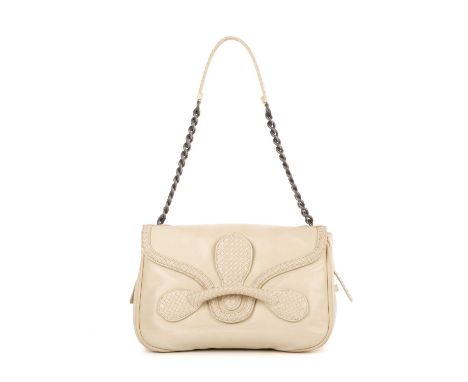 Bottega Veneta, a Rialto handbag, crafted from smooth cream leather, featuring the maker's signature woven Intrecciato leathe