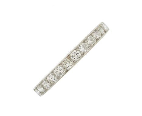 A mid 20th century platinum circular-cut diamond full eternity ring, personal engraving to one side dated 1949, estimated tot