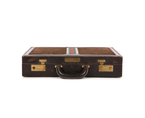 Gucci, a vintage briefcase, designed with a brown suede exterior with smooth brown leather trim, featuring the maker's signat
