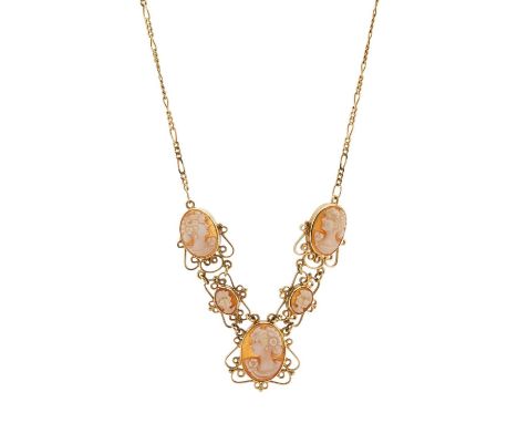 An 18ct gold shell cameo necklace, designed as five carved panels, with openwork surround and integral figaro-link chain, Ita