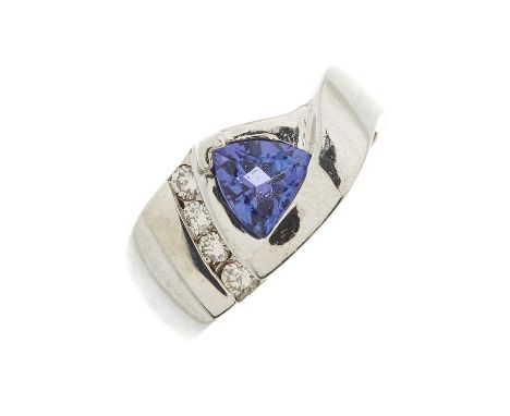 A 14ct gold tanzanite dress ring, with brilliant-cut diamond curved line highlight and tapered band, estimated total diamond 