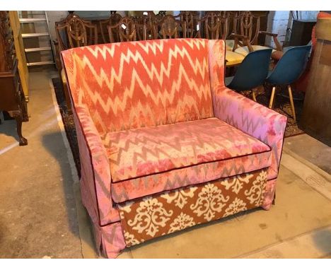 A  Bespoke Sofa, London sofa bed, love seat size, in hot pink with lightening bolt decoration (97cm x 114cm x 86cm), complete