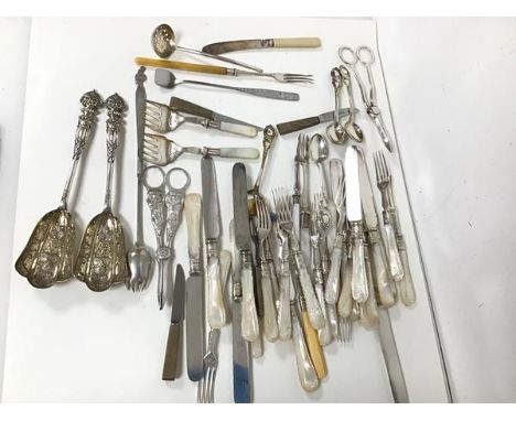 An assortment of Epns including mother of pearl handled fruit knives and forks, grape scissors, scoops etc. (a lot)