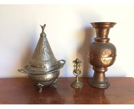 A brass ship/railway weighted candle, with an aperture to base for attachment to table (26cm), a copper vase with foliate dec