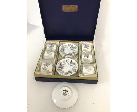 A 1960s Coalport coffee set, in Camelot pattern, comprising eight cups and saucers (saucer: 11cm), each marked Jaguar, inscri