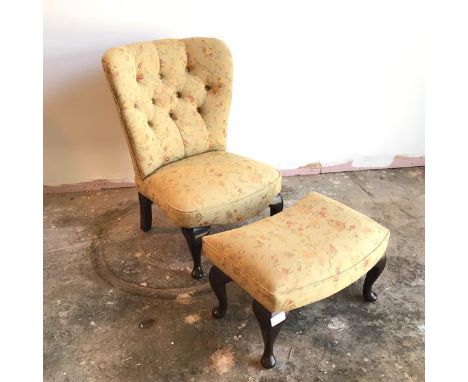 A Jade Holdings slipper chair with button back, in flower and butterfly upholstery, on front cabriole supports terminating in