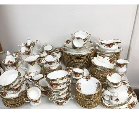 A large Royal Albert Old Country Rose dinner service including eighteen dinner plates (26cm), side plates, lunch plates, soup