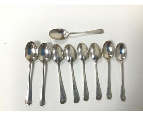 A set of nine 1921 Sheffield silver teaspoons, initialled M (combined: 207.53g)