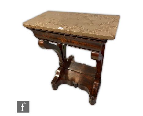 A 19th Century mahogany console table, the marble top above a cushion frieze drawer and scroll supports, with a mirror panel 