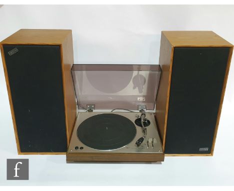 An Akai AP-003 turntable, in wood and brushed aluminium case, together with a pair of Celestion Ditton 15 x R speakers. 