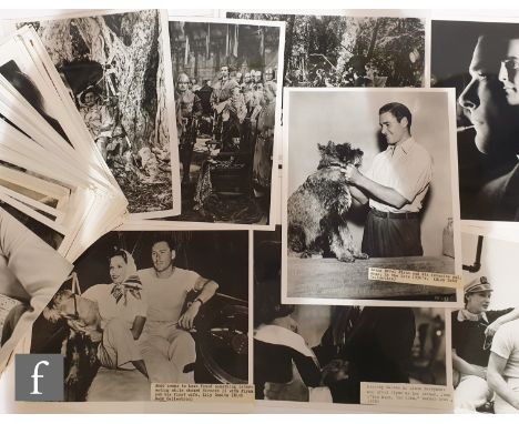A collection of Errol Flynn publicity and film stills to include The Adventures of Robin Hood, Captain Blood and various othe