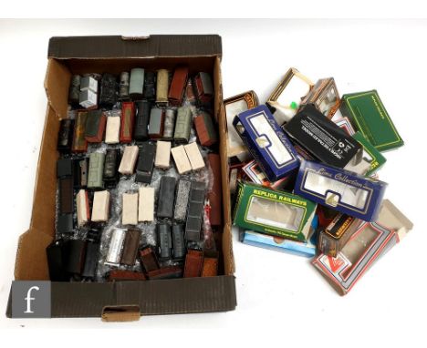 A collection of fifty items of rolling stock by Hornby and Bachmann, some weathered or modified, unboxed but with a selection