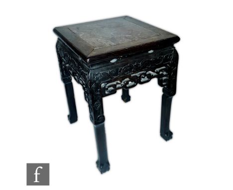 A Chinese late Qing Dynasty (1644-1912) Chinese Huanghuali style jardiniere stand, the low square section stand inset with ma