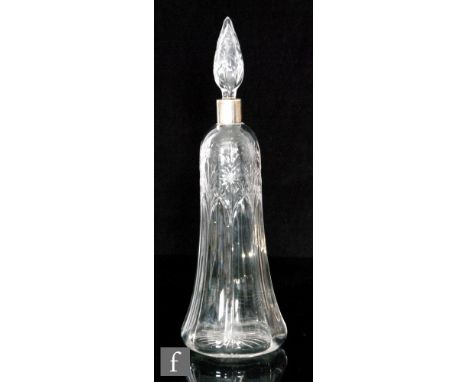 An early 20th Century Stevens &amp; Williams spirit flask of fluted tapered form with a white metal collar and a spire form s