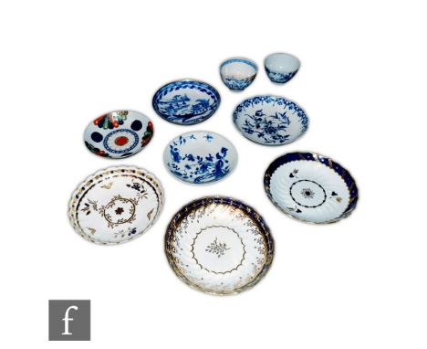 A collection of assorted 18th Century Worcester teawares to include a Japan Fan pattern saucer, blue and white saucers, wryth