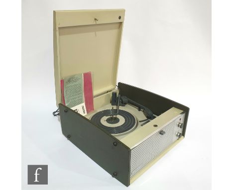 A 1960s Ferguson model 3010 portable record player, with original receipt dated 1966 and guarantee and instruction manual. 