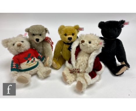 A collection of five Steiff teddy bears, comprising Christmas 2009 Bear, white tag 036002, cream alpaca, wearing Christmas ju