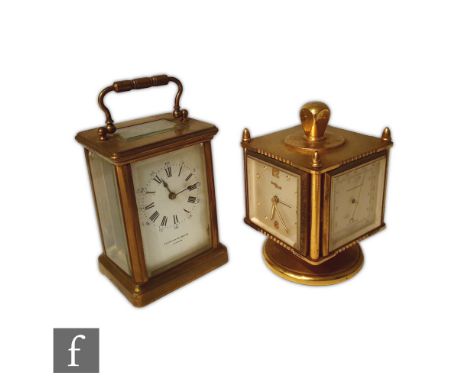 A post 1950s Imhof revolving thermometer, barometer and hydrometer clock and a brass carriage clock by Jenner &amp; Knewstrub