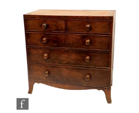 A George IV mahogany veneered chest of two short over three long cock-beaded drawers, raised to French bracket feet, with lat