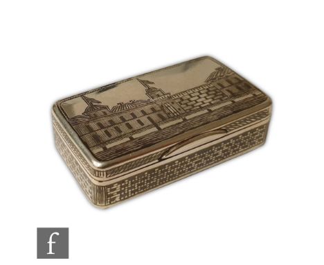 A Russian silver cushioned rectangular snuff box with neillo work building to the hinged cover and a geometric pattern to the
