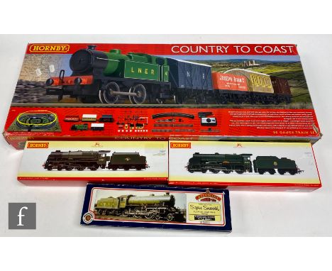 An OO gauge Hornby R1201 Country to Coast train set, comprising 0-4-0T LNER green 4 locomotive, passenger coach, brake van an